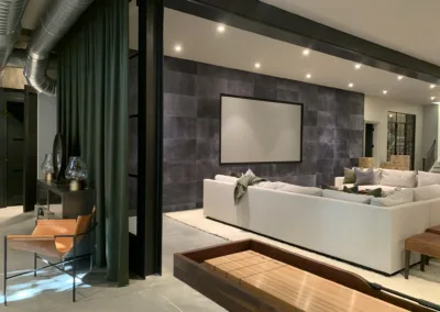 A modern living room with a shuffleboard table.