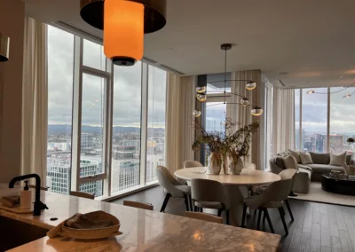 A living room with a view of the city.