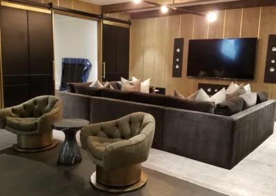 A living room with a large flat screen tv.