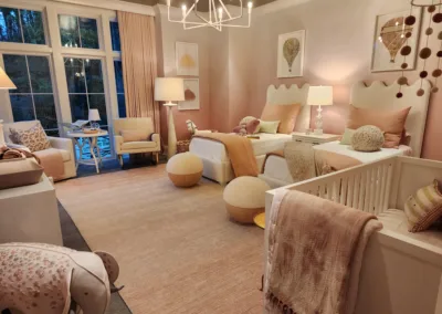 A baby's room with a giraffe theme.